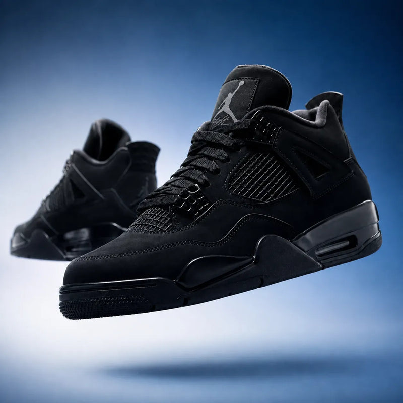 Black sneaker displayed in a studio setting